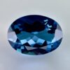High quality 3.22ct oval shaped London Blue Topaz with a deep blue hue, luminous brilliance and excellent clarity - perfect for fine jewelry designs.