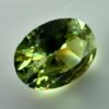0.40 carat natural demantoid garnet from Namibia, very bright green color, oval cut, and untreated.